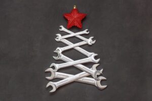 wrenches-arranged-like-christmas-tree-with-red-bow-on-top